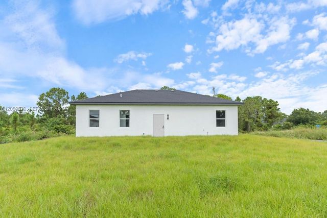 708 PEACOCK AVE, Lehigh Acres, FL 33974