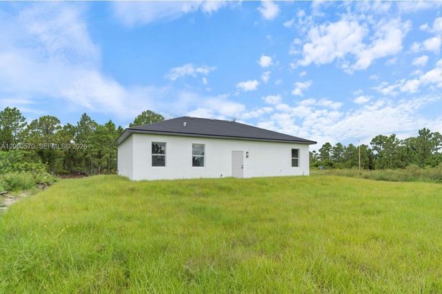 708 PEACOCK AVE, Lehigh Acres, FL 33974