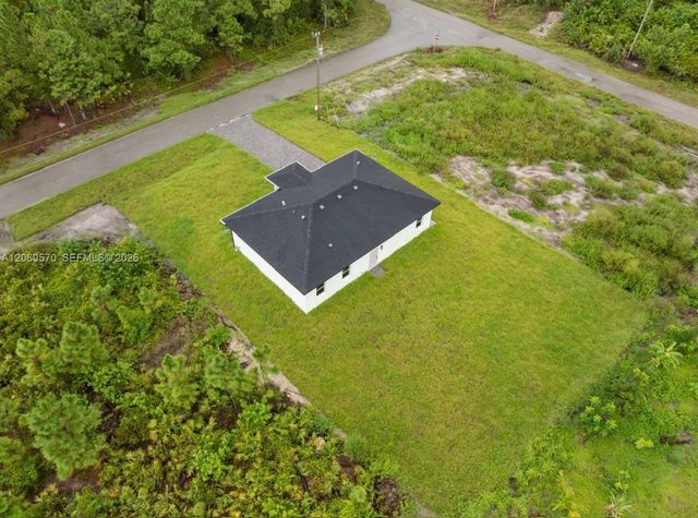 708 PEACOCK AVE, Lehigh Acres, FL 33974