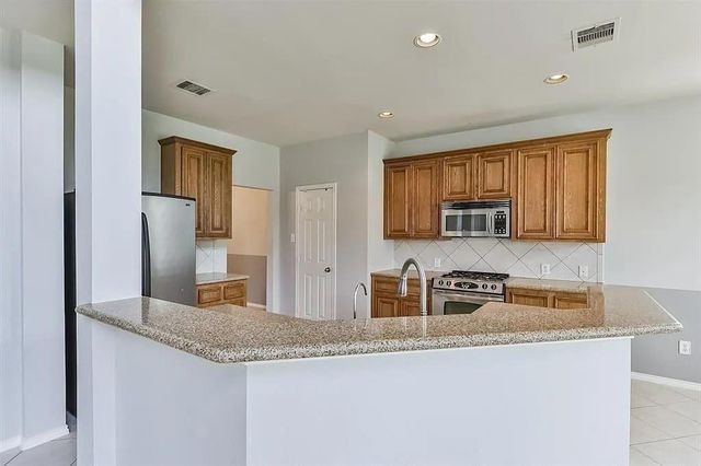 13002 Misty Bay Ln, Pearland, TX 77584