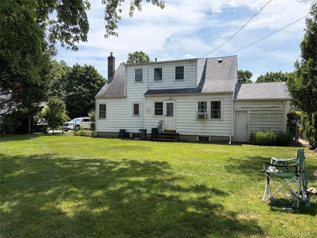 87 Parkway Drive, Westbury, NY 11590