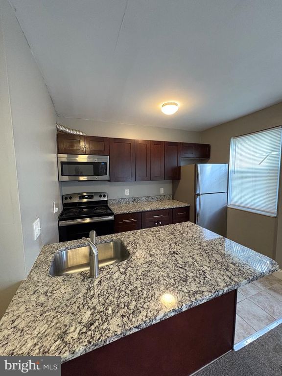 Image 2 of property listing at 911 SAINT DUNSTANS RD, Baltimore, MD 21212