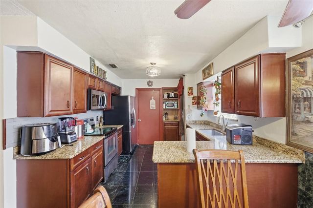 3027 QUEENSGATE ROAD, Orlando, FL 32818