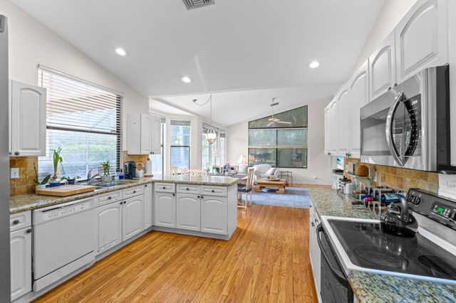 9055 Cypress Hollow Drive, Palm Beach Gardens, FL 33418