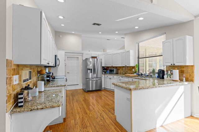 9055 Cypress Hollow Drive, Palm Beach Gardens, FL 33418