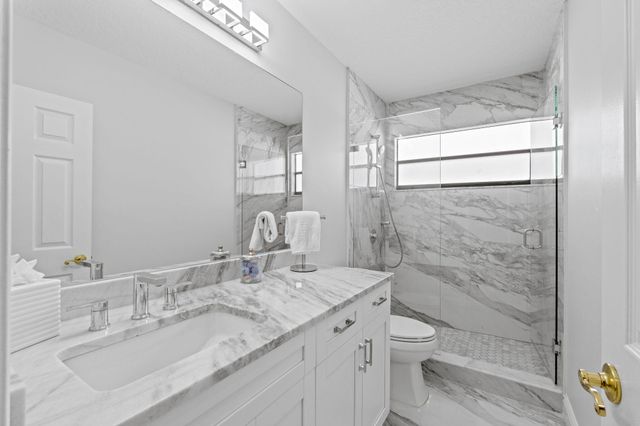 9055 Cypress Hollow Drive, Palm Beach Gardens, FL 33418