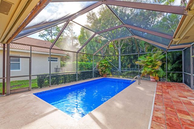 9055 Cypress Hollow Drive, Palm Beach Gardens, FL 33418