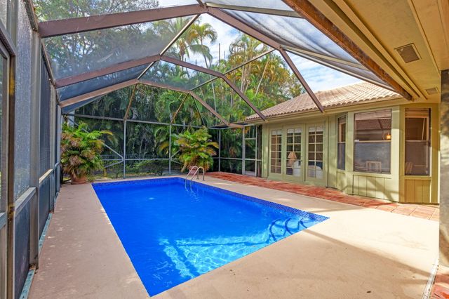 9055 Cypress Hollow Drive, Palm Beach Gardens, FL 33418