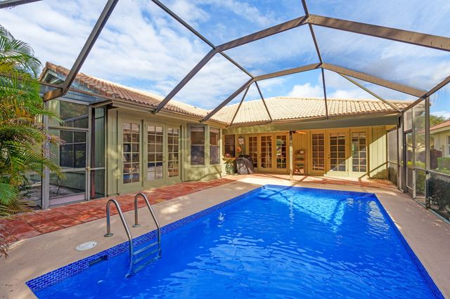 9055 Cypress Hollow Drive, Palm Beach Gardens, FL 33418