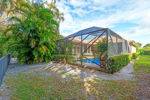 9055 Cypress Hollow Drive, Palm Beach Gardens, FL 33418