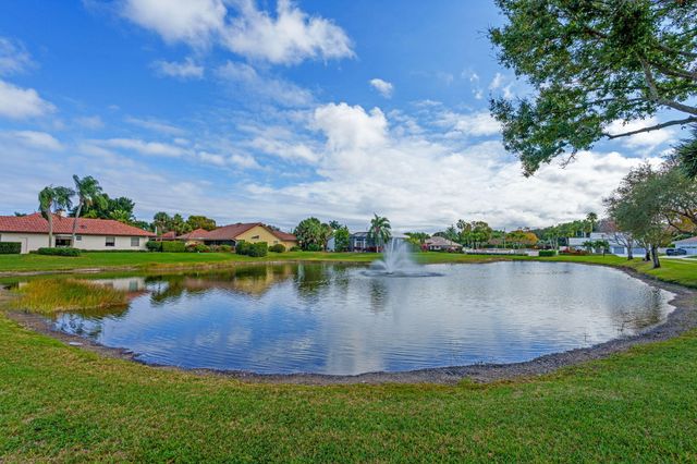 9055 Cypress Hollow Drive, Palm Beach Gardens, FL 33418