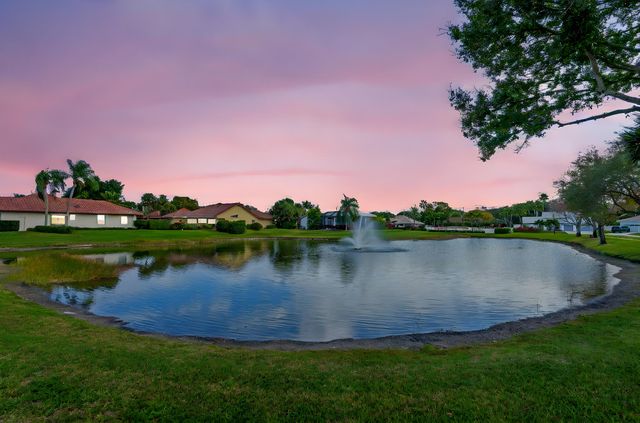 9055 Cypress Hollow Drive, Palm Beach Gardens, FL 33418