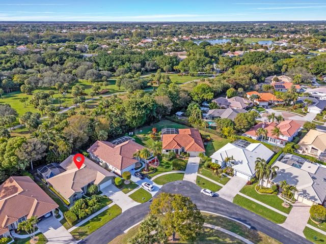 9055 Cypress Hollow Drive, Palm Beach Gardens, FL 33418