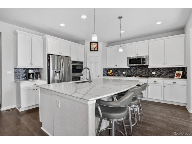 7242 S Old Hammer Ct, Aurora, CO 80016