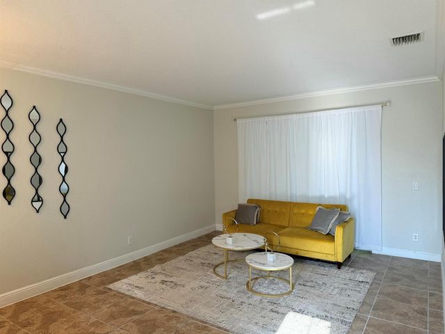 6566 Spring Meadow Drive, Greenacres, FL 33413