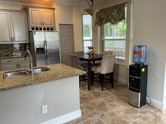 6566 Spring Meadow Drive, Greenacres, FL 33413