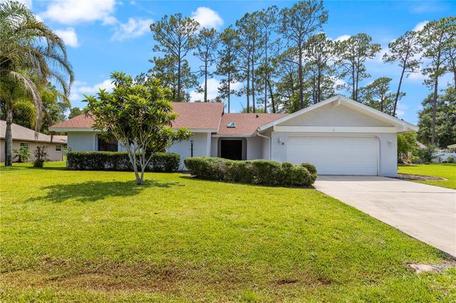 10 VILLAGE LANE, Palm Coast, FL 32164