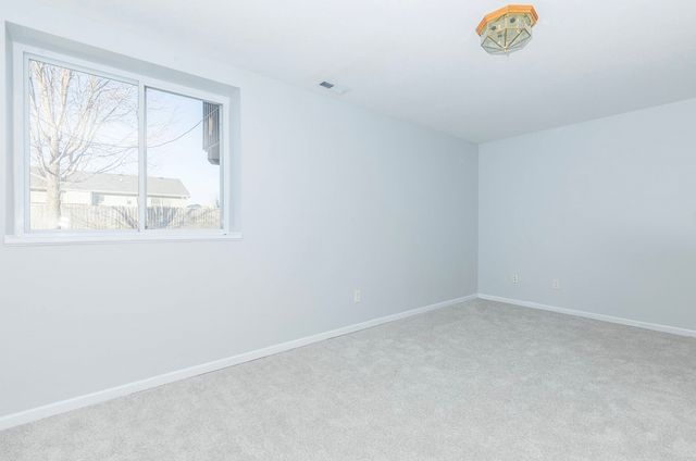 2905 SE Stone Ridge Street, Grimes, IA 50111