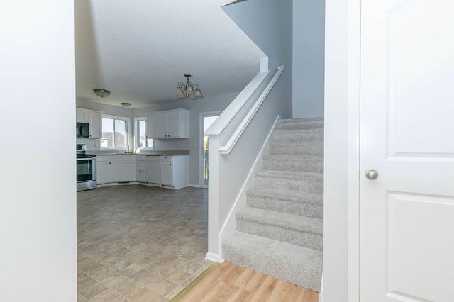 2905 SE Stone Ridge Street, Grimes, IA 50111