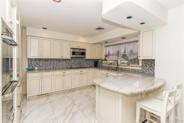 253 E Meadow Avenue, East Meadow, NY 11554