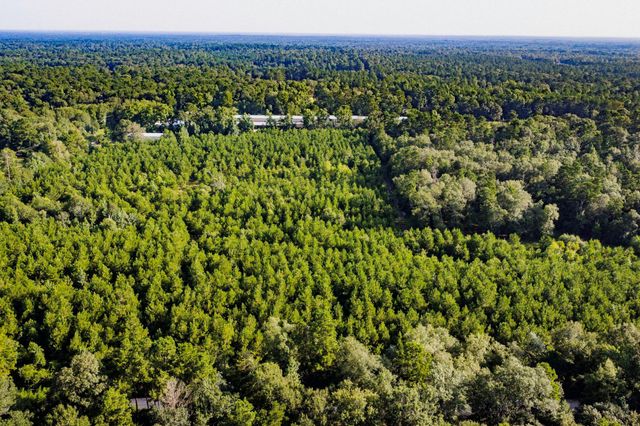 1378 N Duck Creek B Road, Cleveland, TX 77328