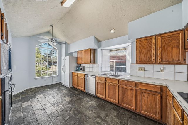 15974 Oak Mountain Drive, Houston, TX 77095