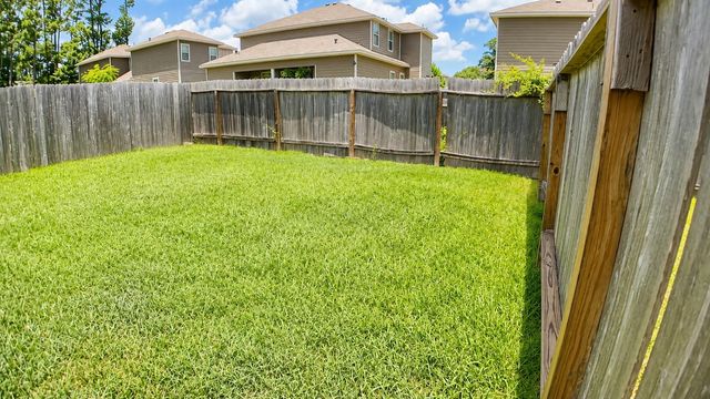124 Camelot Place Court, Conroe, TX 77304