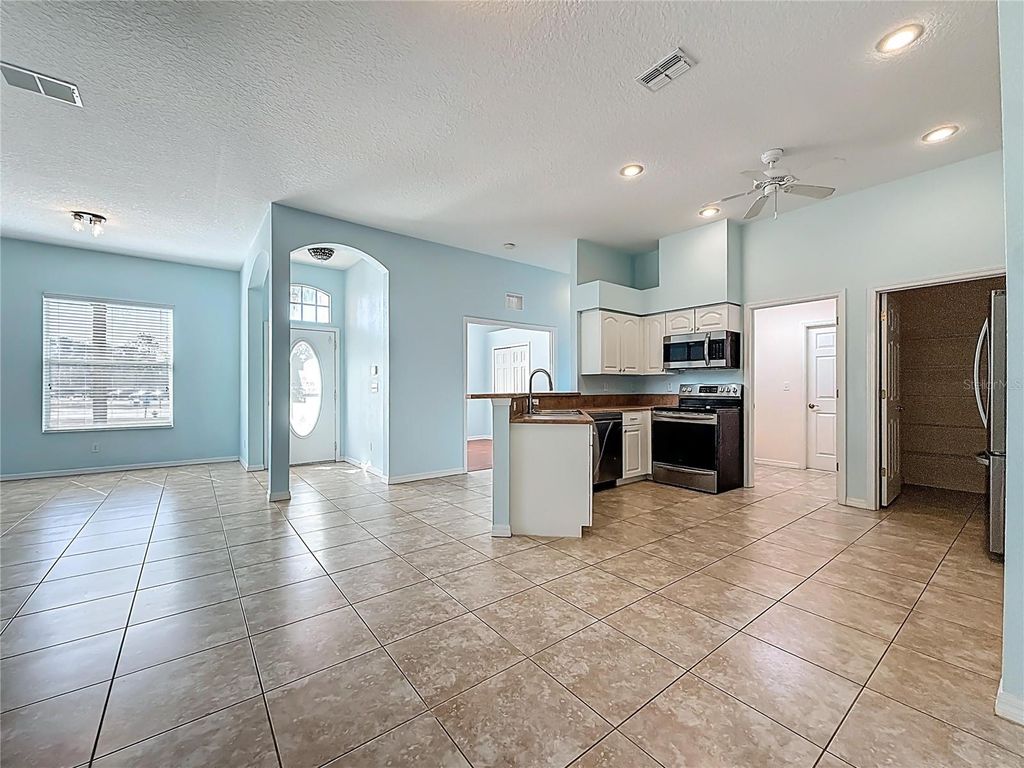 Image 24 of property listing at 12014 TOURNAMENT VIEW AVENUE, New Port Richey, FL 34654