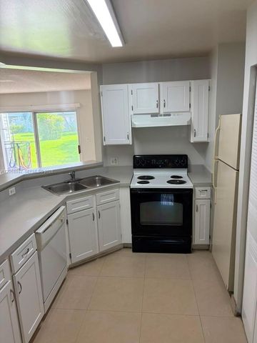 3461 NW 44th Street 102, Oakland Park, FL 33309