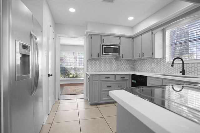 5515 Enchanted Timbers Drive, Humble, TX 77346