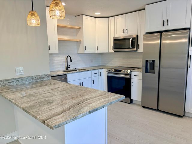 909 S Colonial Court C, Indian Harbour Beach, FL 32937