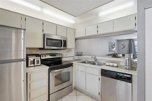 10451 W Broward Boulevard 209, Plantation, FL 33324