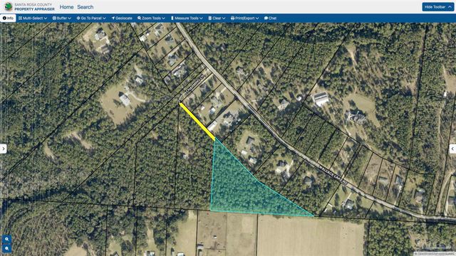001 Wallace Lake Rd, Pace, FL 32571