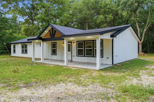 13828 Bronte Courts Drive, Willis, TX 77378