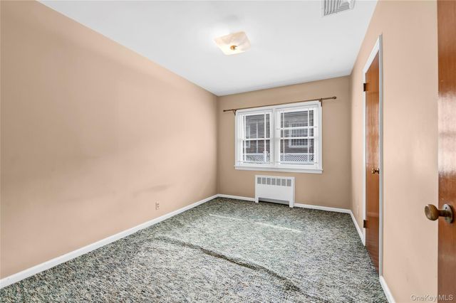 61-46 213th Street, Bayside, NY 11364