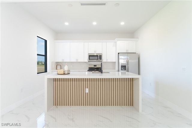 1407 NE 5th AVE, Cape Coral, FL 33909