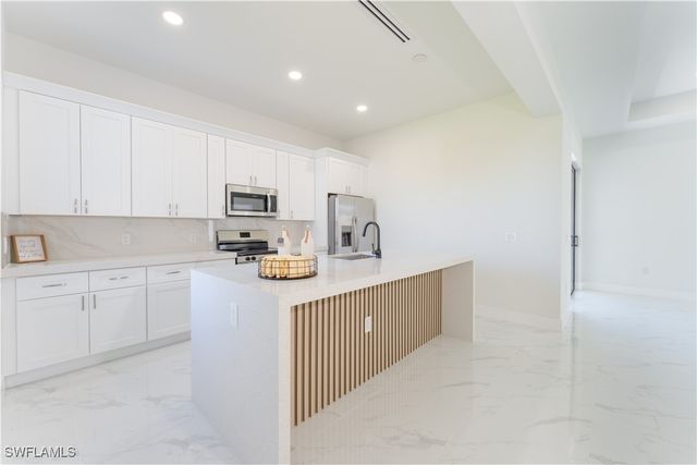 1407 NE 5th AVE, Cape Coral, FL 33909