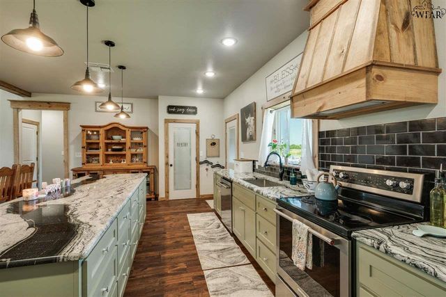 2411 RIFLE RANGE ROAD, Iowa Park, TX 76367