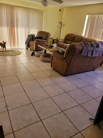 65 Maplecrest Circle, Jupiter, FL 33458