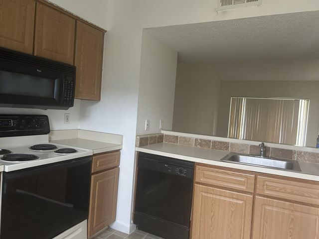 1015 Lake Shore Drive 202, Lake Park, FL 33403