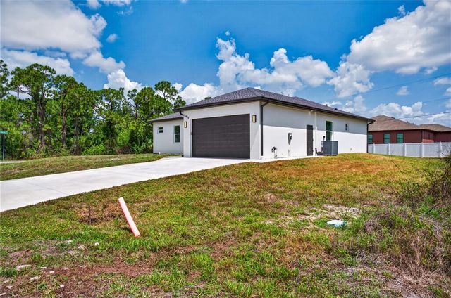 12462 DEEPWOODS AVENUE, Port Charlotte, FL 33981