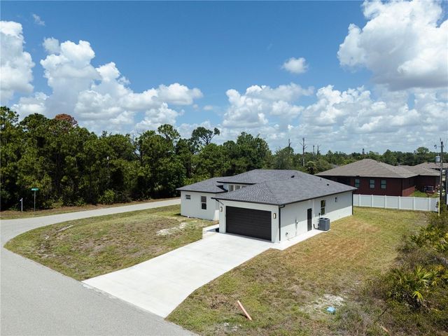 12462 DEEPWOODS AVENUE, Port Charlotte, FL 33981