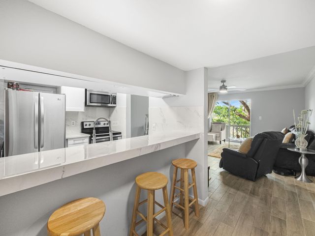 10772 La Placida Drive 7-303, Coral Springs, FL 33065