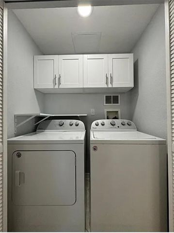 9402 LAKE CHASE ISLAND WAY 9402, Tampa, FL 33626