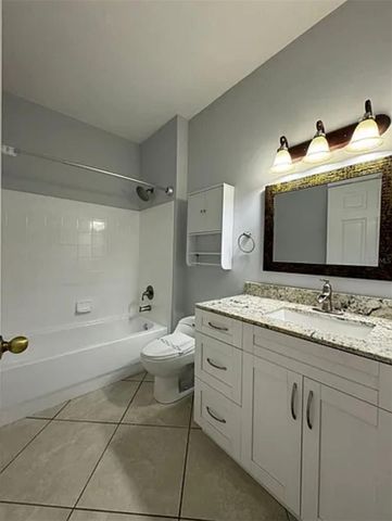 9402 LAKE CHASE ISLAND WAY 9402, Tampa, FL 33626