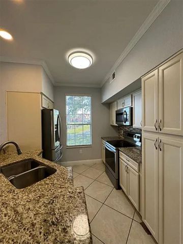 9402 LAKE CHASE ISLAND WAY 9402, Tampa, FL 33626