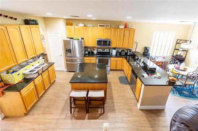 8713 Pegasus DR, Lehigh Acres, FL 33971