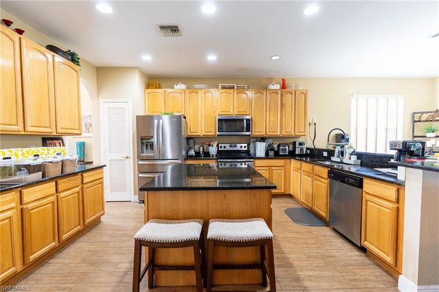 8713 Pegasus DR, Lehigh Acres, FL 33971