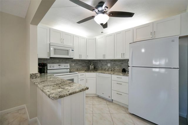 444 Pine Glen Lane D-1, Greenacres, FL 33463