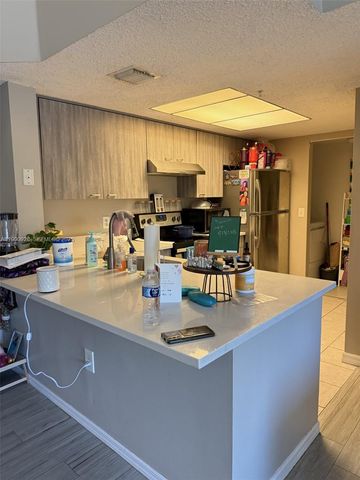 5015 Wiles Road 207, Coconut Creek, FL 33073